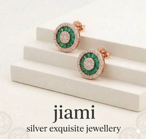 The Emerald Aura Studs