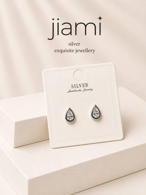 Radiant Teardrop Halo Studs