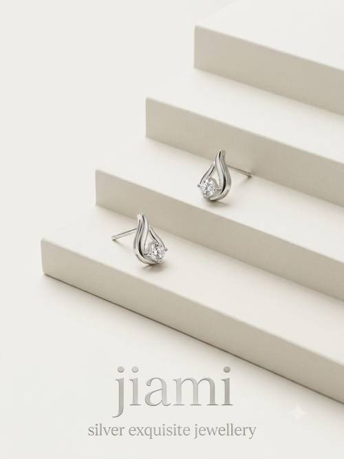 Radiant Teardrop Studs
